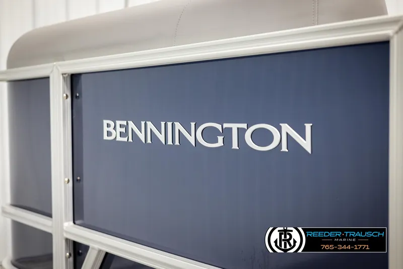 Slide: The Image of 2025 Bennington 188 SSSE boat, blue panel with logo, Reeder-Trausch Marine branding. - 44