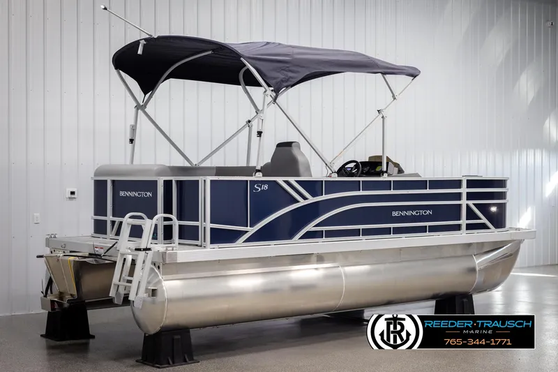 Slide: The Image of 2025 Bennington 188 SSSE pontoon boat with canopy in showroom. - 6