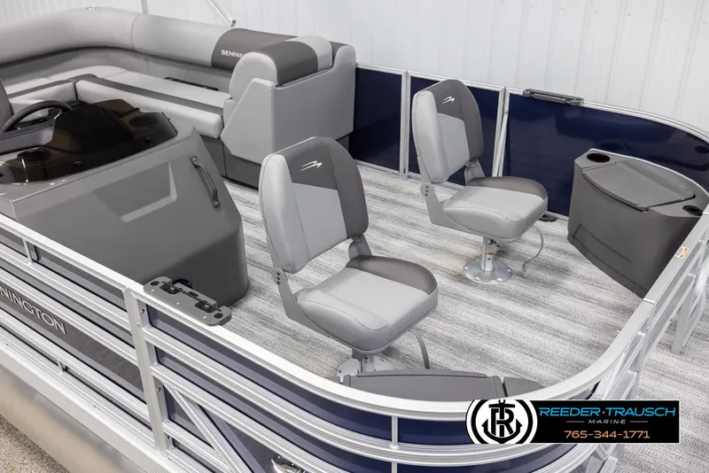 Slide: The Image of 2025 Bennington 188 SSSE pontoon boat interior with gray seating and steering console. - 9