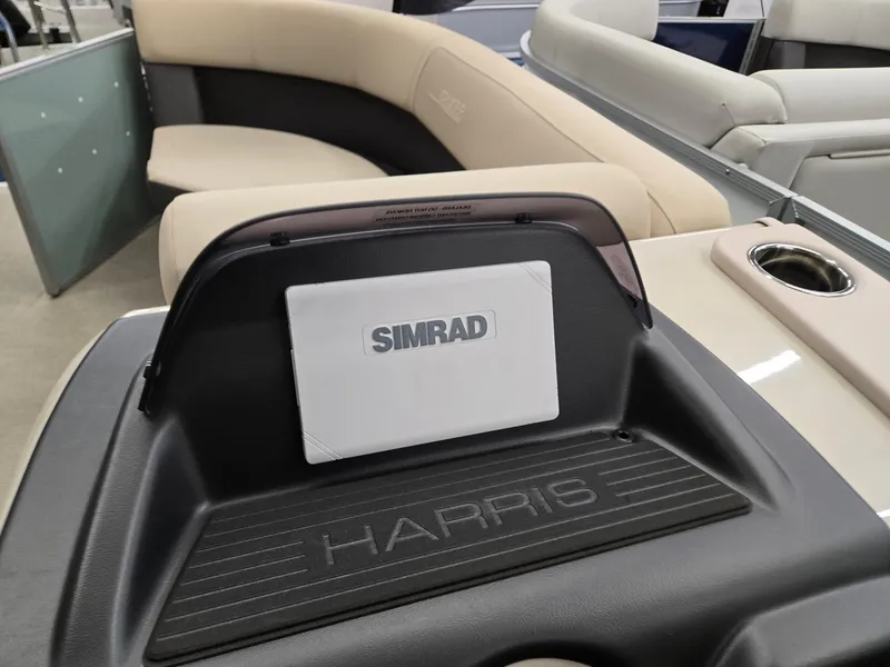 Slide: The Image of 2025 Harris Cruiser 210 boat interior with Simrad navigation system. - 8