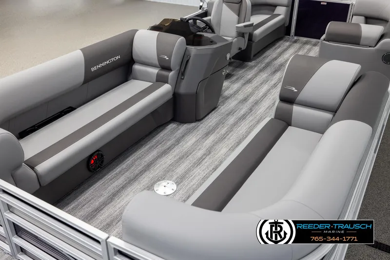 Slide: The Image of 2025 Bennington 21 SSRSE pontoon boat interior with gray seating and modern design. - 10