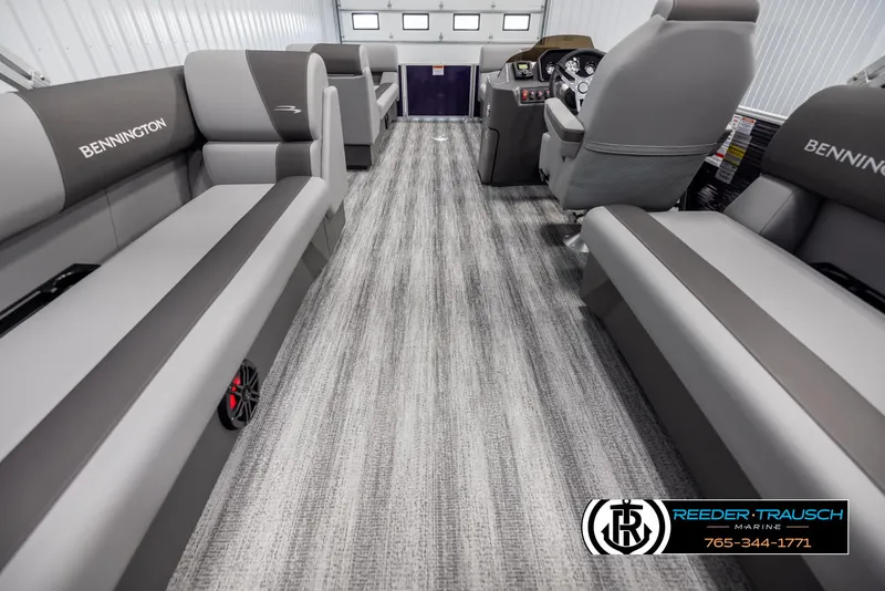 Slide: The Image of Interior of 2025 Bennington 21 SSRSE pontoon boat with luxurious seating and modern design. - 16