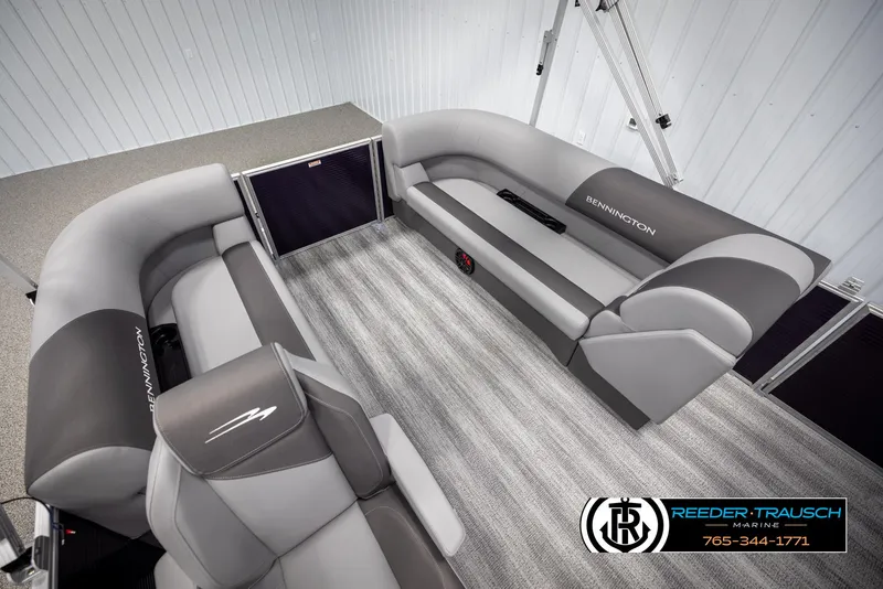 Slide: The Image of 2025 Bennington 21 SSRSE pontoon boat interior with gray seating and modern design. - 20