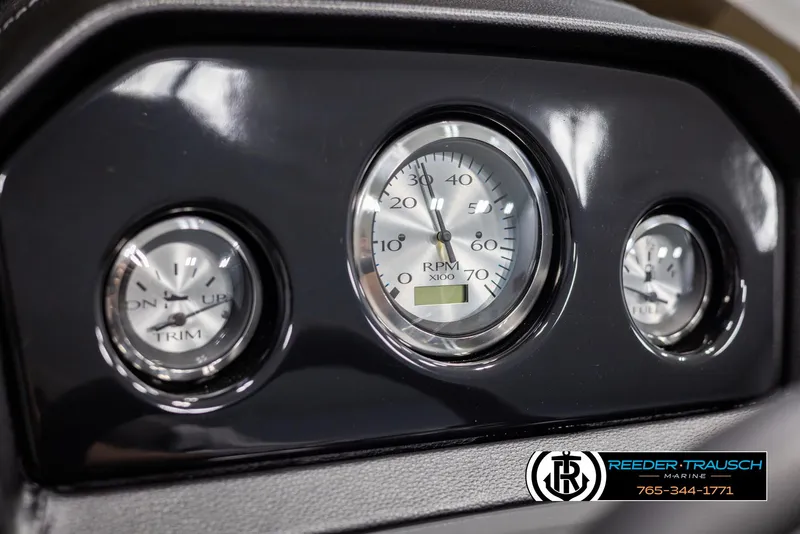 Slide: The Image of Dashboard of 2025 Bennington 21 SSRSE boat with RPM and trim gauges. - 29