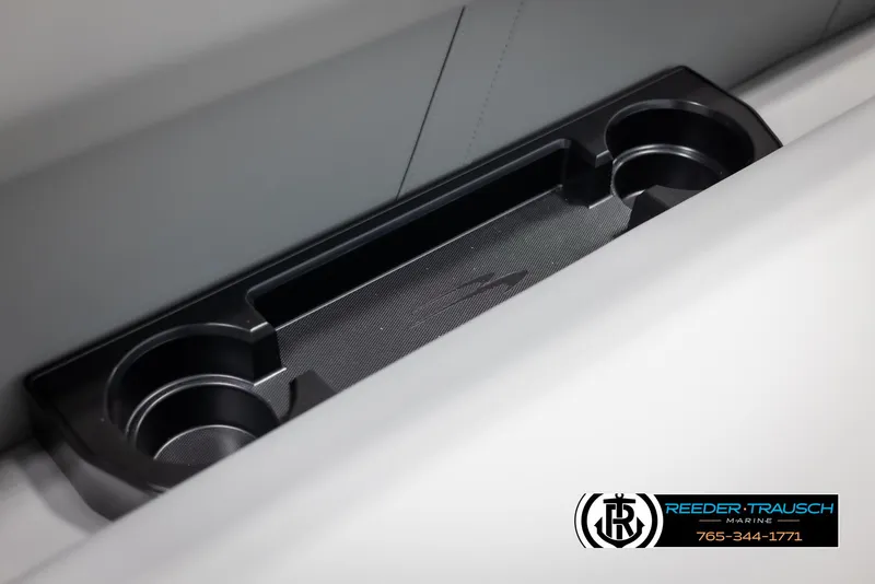 Slide: The Image of Cup holders in 2025 Bennington 21 SSRSE boat, featuring sleek black design. - 33