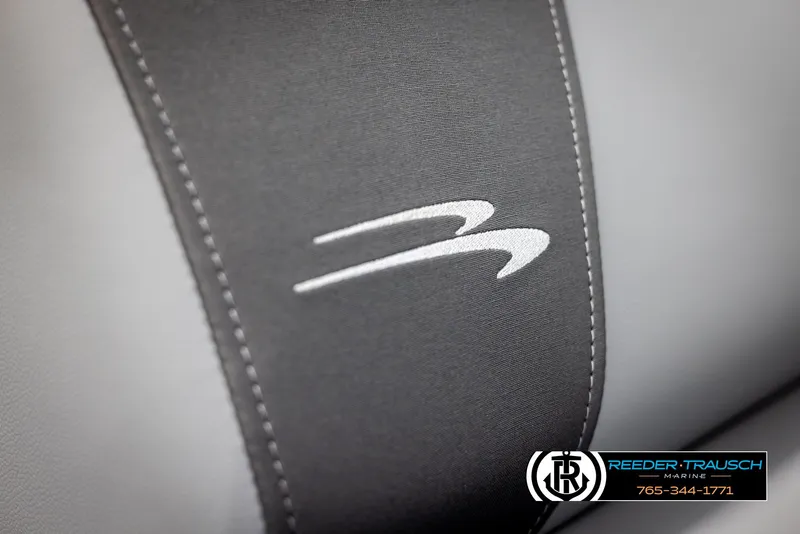 Slide: The Image of Close-up of 2025 Bennington 21 SSRSE boat seat with logo and stitching detail. - 35