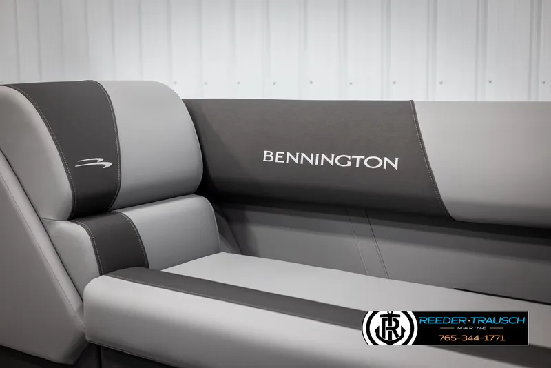 Slide: The Image of 2025 Bennington 21 SSRSE boat interior with branded seating, showcased by Reeder-Trausch Marine. - 36