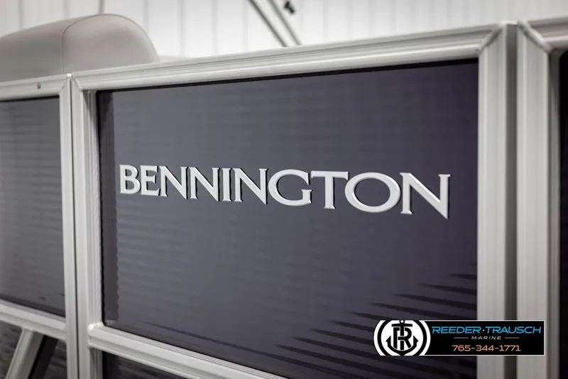 Slide: The Image of 2025 Bennington 21 SSRSE boat side panel with logo, Reeder-Trausch Marine branding. - 44