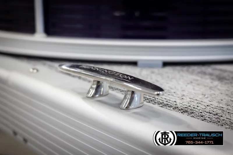 Slide: The Image of 2025 Bennington 21 SSRSE boat cleat with Reeder-Trausch Marine logo. - 45