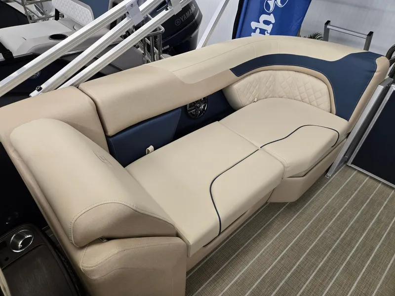 Slide: The Image of 2025 Godfrey SWEETWATER 2286 SB boat seating, beige and blue upholstery, luxurious design. - 14