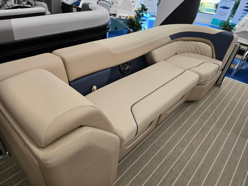 Slide: The Image of Luxurious seating on 2025 Godfrey SWEETWATER 2286 SB pontoon boat, featuring beige upholstery. - 26
