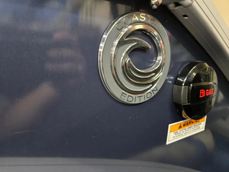 Slide: The Image of 2025 Godfrey SWEETWATER 2286 SB, Coast Edition emblem and gas cap detail. - 31