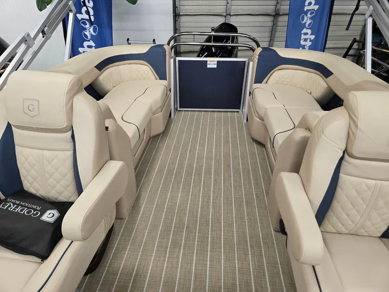 Slide: The Image of Luxurious 2025 Godfrey SWEETWATER 2286 SB pontoon boat with plush seating and elegant design. - 4