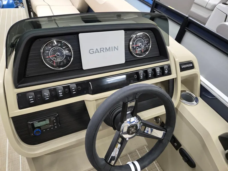 Slide: The Image of 2025 Godfrey SWEETWATER 2286 SB boat dashboard with Garmin navigation system. - 7