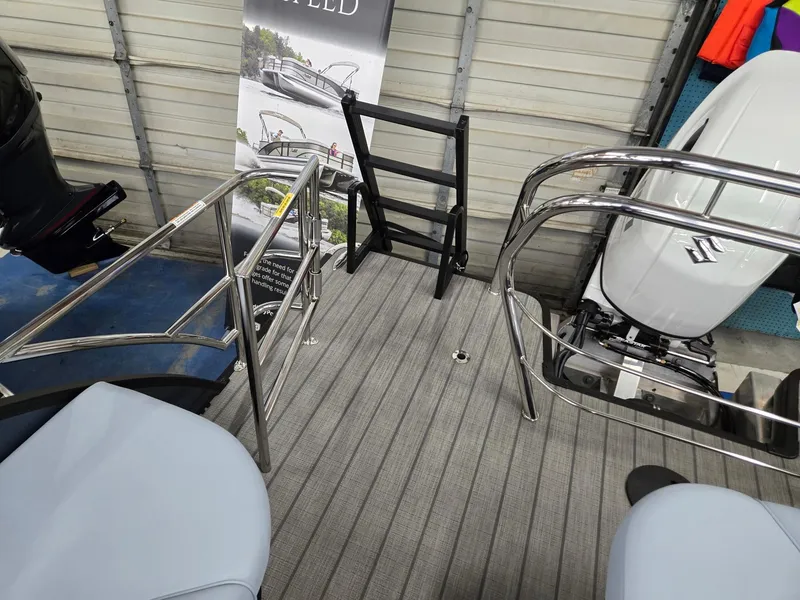 Slide: The Image of Interior view of 2025 Godfrey SWEETWATER 2286 SFL boat with seating and railing. - 18