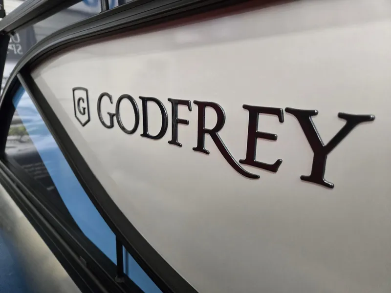 Slide: The Image of 2025 Godfrey SWEETWATER 2286 SFL boat logo close-up. - 31
