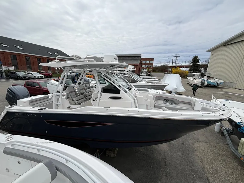 Slide: The Image of 2025 Solara S-250 CW boat in marina, sleek design, modern features. - 0