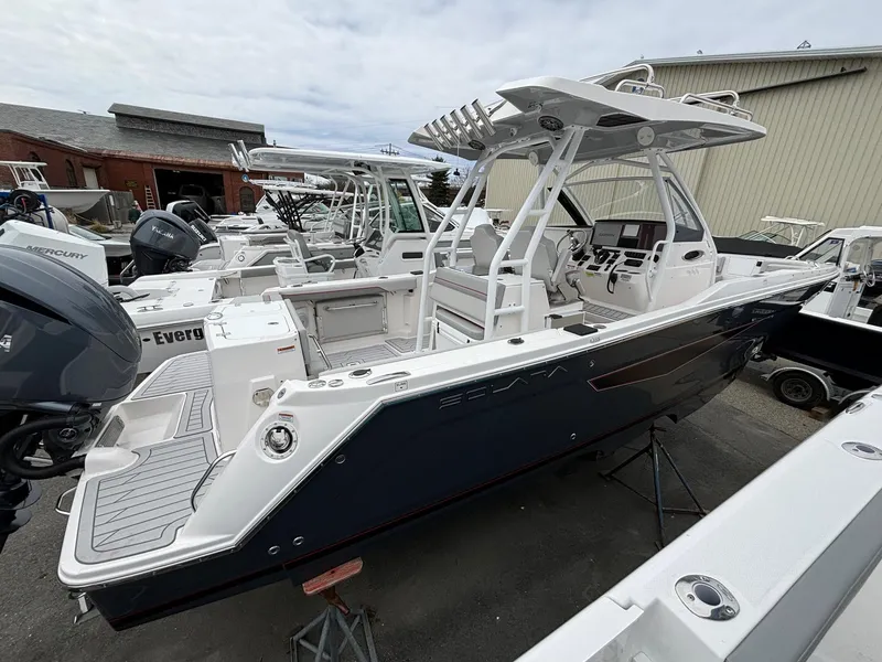 Slide: The Image of 2025 Solara S-250 CW boat, sleek design, docked in a marina. - 1