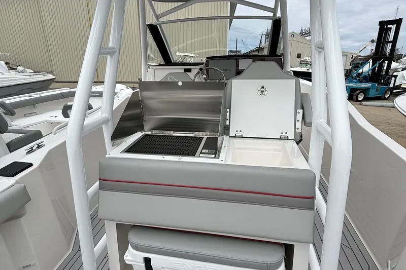 Slide: The Image of 2025 Solara S-250 CW boat with onboard grill and storage area. - 16