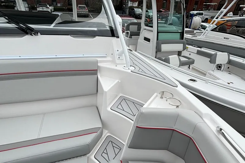 Slide: The Image of 2025 Solara S-250 CW boat interior with sleek seating and modern design. - 18