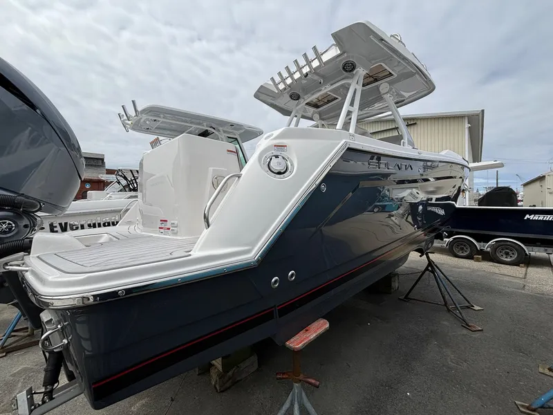 Slide: The Image of 2025 Solara S-250 CW boat on display, sleek design, elevated view. - 5