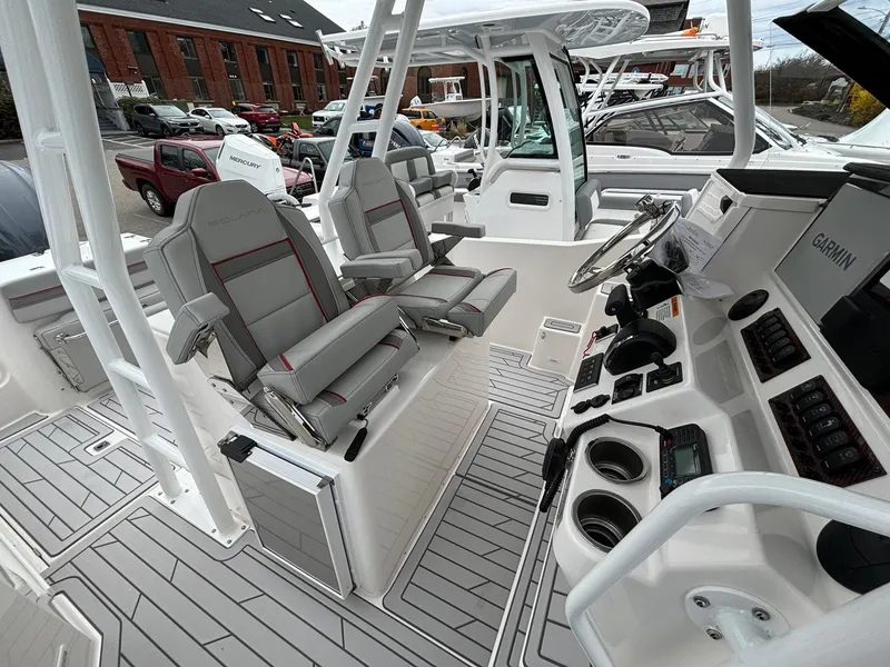 Slide: The Image of 2025 Solara S-250 CW boat interior with modern helm and seating. - 6
