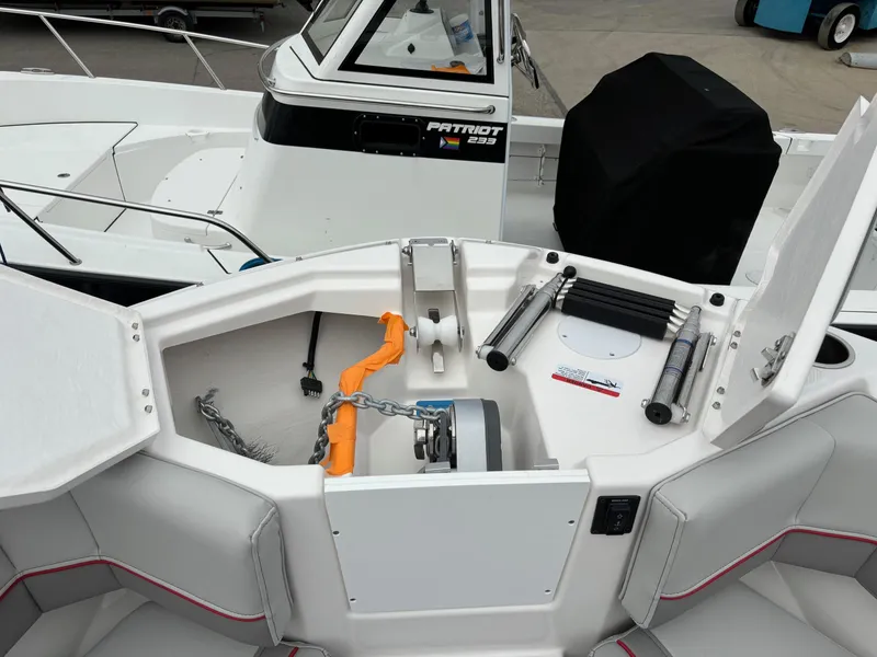 Slide: The Image of Solara S-250 CW 2025 boat anchor compartment with winch and storage features. - 8