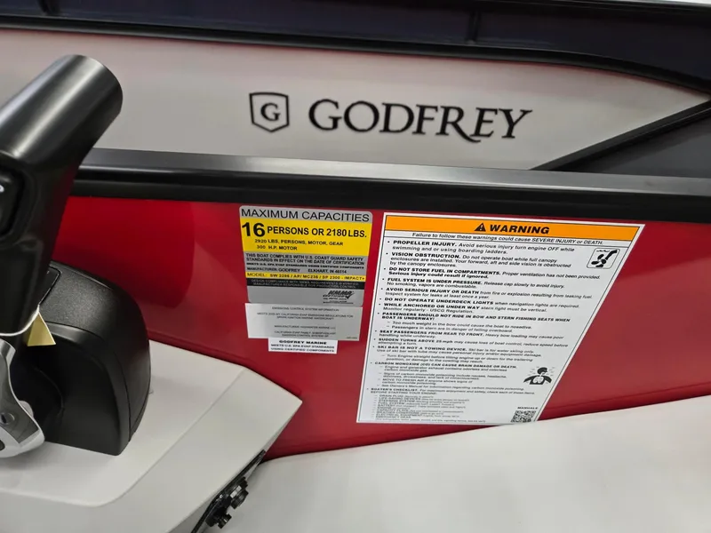 Slide: The Image of 2025 Godfrey Sweetwater 2286 FS boat capacity label, 16 persons or 2180 lbs. - 14