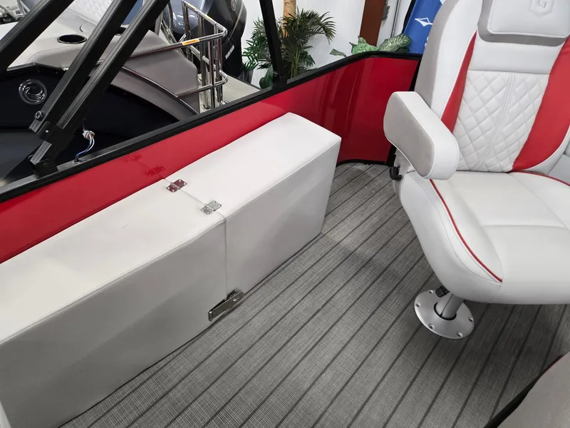 Slide: The Image of 2025 Godfrey Sweetwater 2286 FS interior with red accents and white seating. - 15