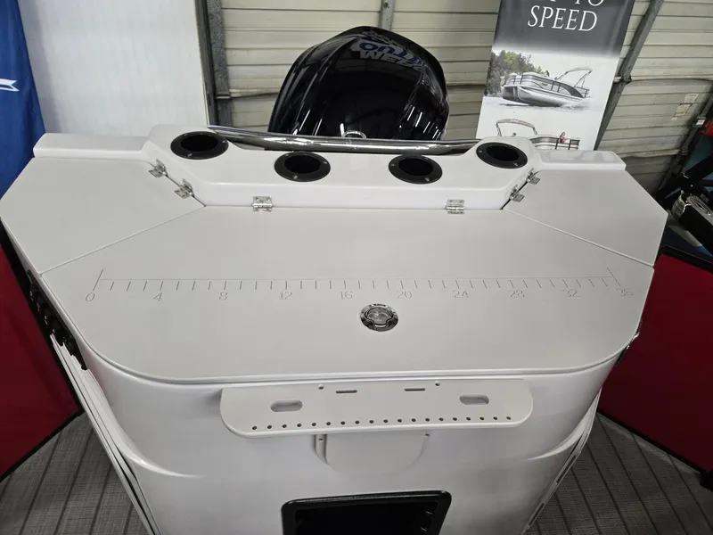 Slide: The Image of 2025 Godfrey Sweetwater 2286 FS boat stern with motor and rod holders. - 18