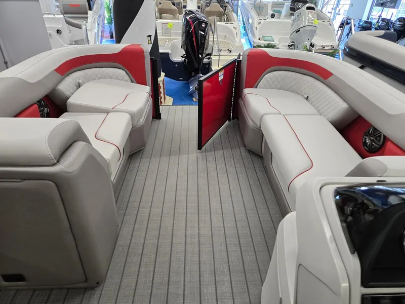 Slide: The Image of Interior of 2025 Godfrey Sweetwater 2286 FS pontoon boat with plush seating. - 25
