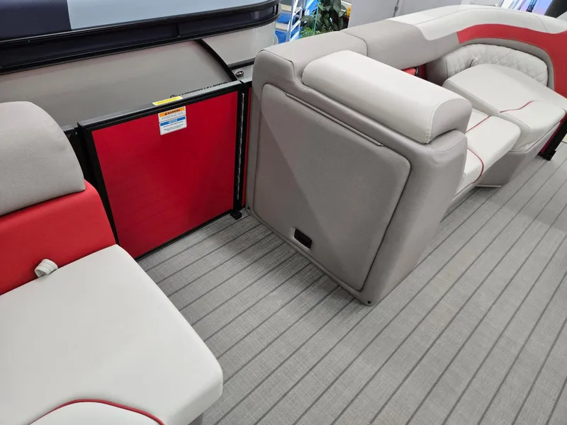 Slide: The Image of Interior of 2025 Godfrey Sweetwater 2286 FS pontoon boat with gray and red seating. - 26