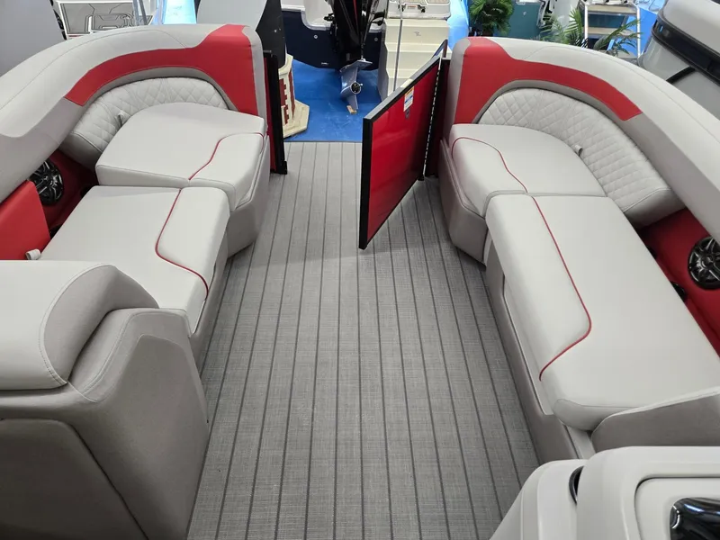 Slide: The Image of 2025 Godfrey Sweetwater 2286 FS boat interior with gray and red seating. - 28