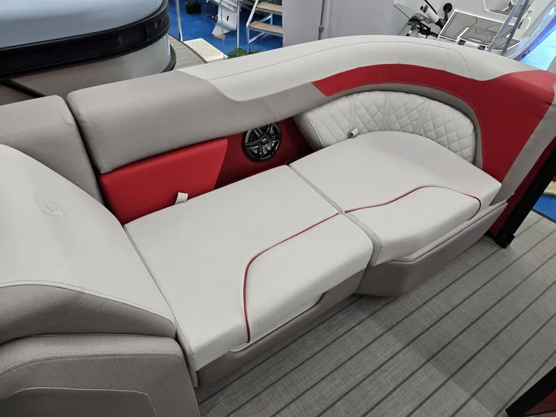 Slide: The Image of 2025 Godfrey Sweetwater 2286 FS boat interior with stylish red and gray seating. - 30