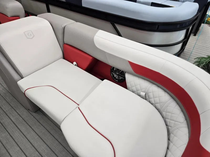 Slide: The Image of Luxurious seating on 2025 Godfrey Sweetwater 2286 FS boat with red and white upholstery. - 6