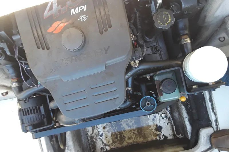 Slide: The Image of Engine of a 2005 Sea Ray 200 SLX boat, featuring a Mercury 4.3L MPI motor. - 5