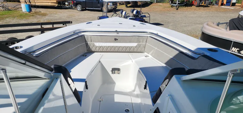 Slide: The Image of 2025 Sea Pro 240 Sport boat interior with spacious seating and modern design. - 6