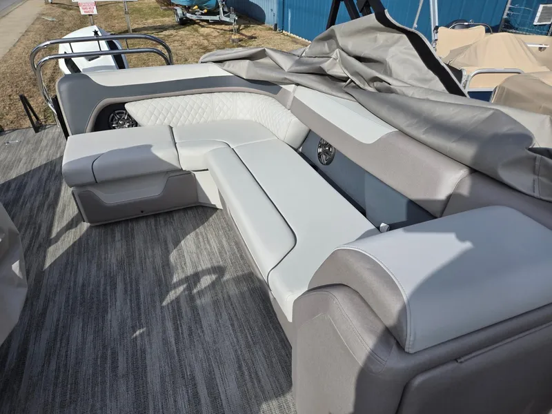 Slide: The Image of 2025 Godfrey Sweetwater 2286 C boat interior with plush seating and modern design. - 11