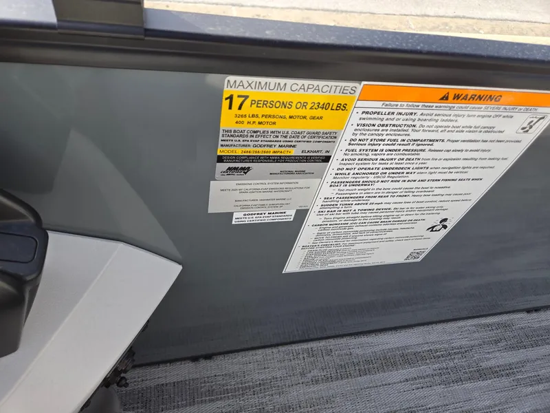 Slide: The Image of Capacity warning label on 2025 Godfrey Sweetwater 2286 C boat, 17 persons or 2340 lbs. - 17