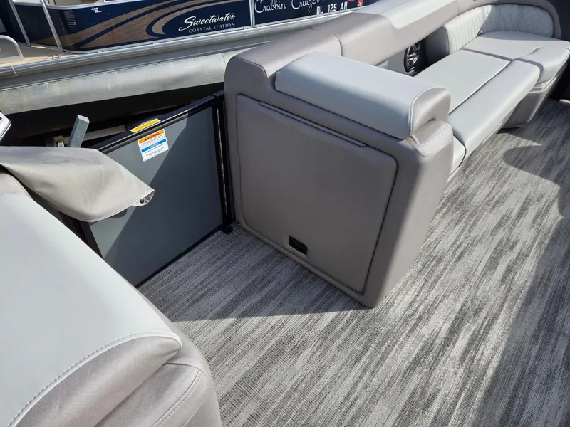 Slide: The Image of 2025 Godfrey Sweetwater 2286 C interior with gray seating and carpet flooring. - 29