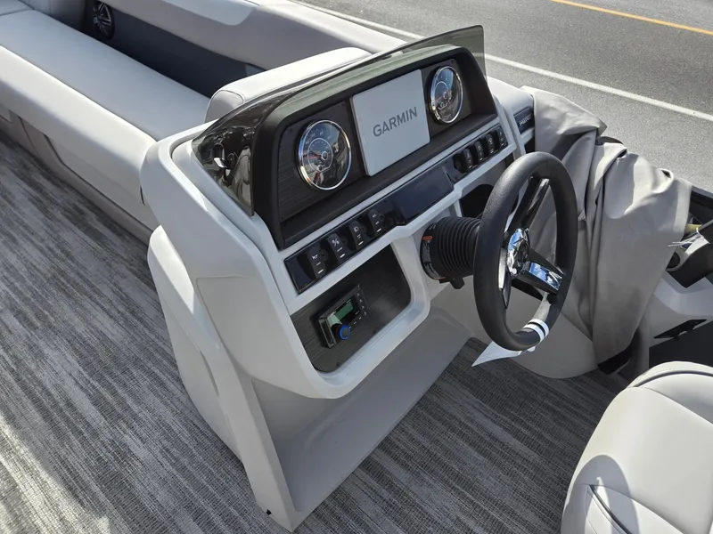 Slide: The Image of 2025 Godfrey Sweetwater 2286 C boat dashboard with Garmin navigation system. - 30