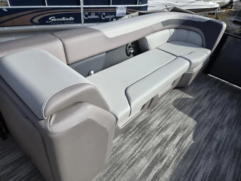 Slide: The Image of 2025 Godfrey Sweetwater 2286 C boat interior with plush seating and modern design. - 33