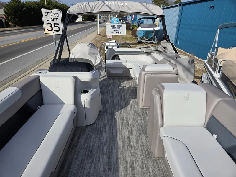 Slide: The Image of 2025 Godfrey Sweetwater 2286 C pontoon boat with spacious seating and modern design. - 8