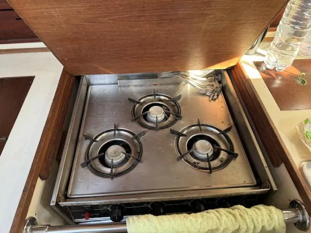 Slide: The Image of Three-burner stove in 1980 Cape Dory 36 yacht kitchen. - 11