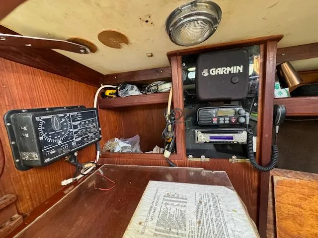 Slide: The Image of Navigation equipment inside a 1980 Cape Dory 36 sailboat cabin. - 26