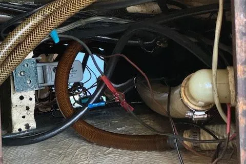 Slide: The Image of Wiring and plumbing inside a 1980 Cape Dory 36 boat. - 29