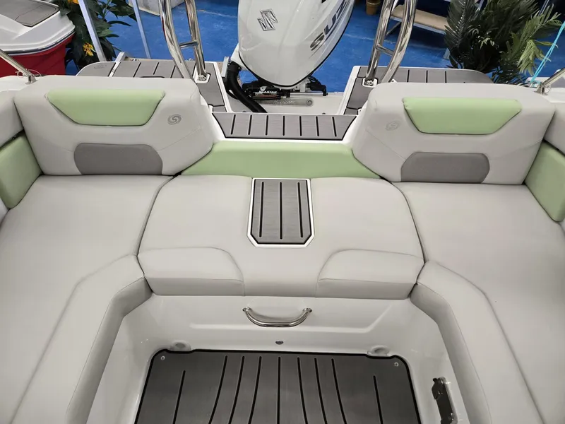 Slide: The Image of 2025 Hurricane SunDeck 2050 OB boat interior with cushioned seating and modern design. - 15