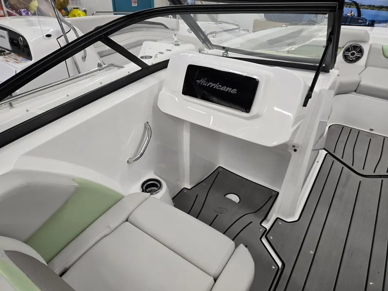 Slide: The Image of 2025 Hurricane SunDeck 2050 OB interior, featuring sleek seating and modern design elements. - 21