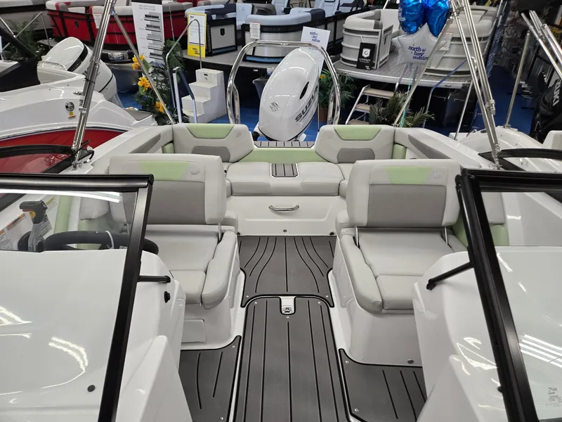 Slide: The Image of 2025 Hurricane SunDeck 2050 OB boat interior with modern seating and sleek design. - 4