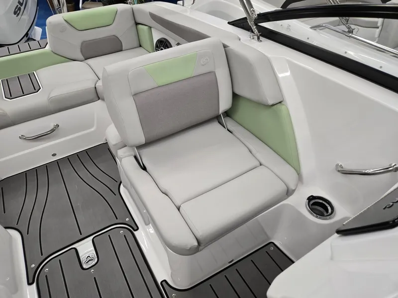 Slide: The Image of 2025 Hurricane SunDeck 2050 OB boat interior with gray and green seating. - 8